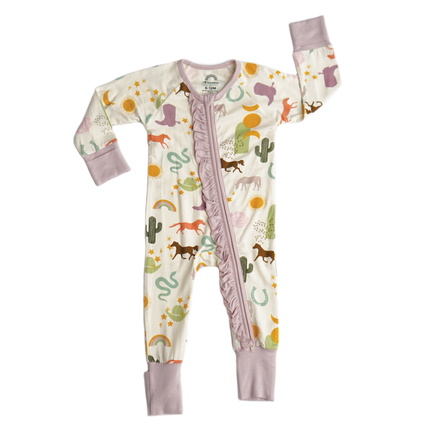 Soft viscose bamboo baby pajamas in our Wild and Free pattern! This cowgirl print is perfect for Spring and Summer.