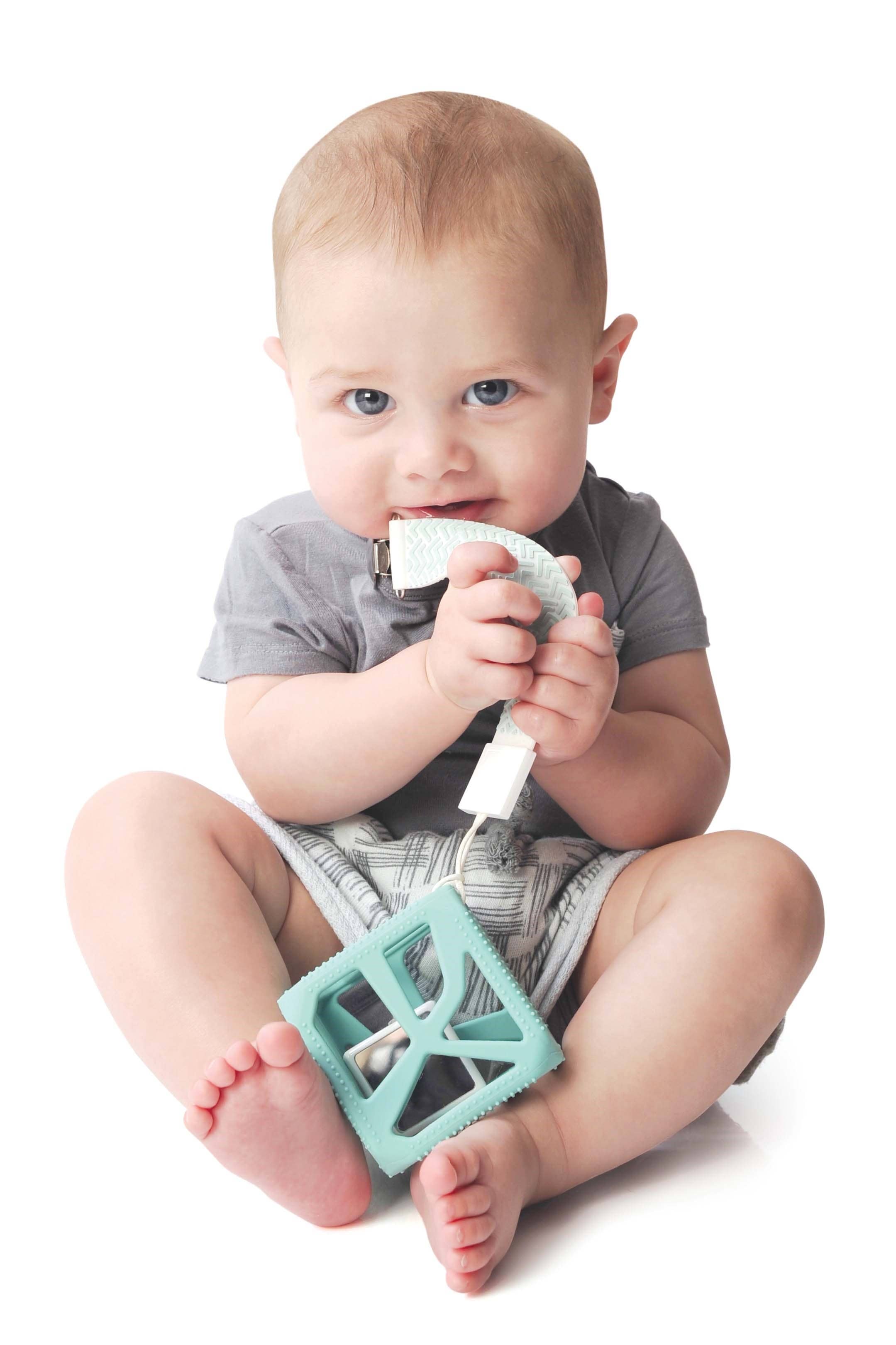 The Teether Tether is a convenient clip that attaches to all fabrics to ensure baby's most soothing toys and pacifier stay close and clean. The Tether is made of soft, flexible, food-grade silicone with textures that gently massage baby's gums. One size. 3+ Months.